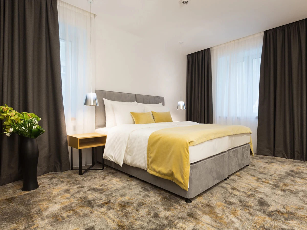 Hotel style bedroom painting finish by Surrey Decorators