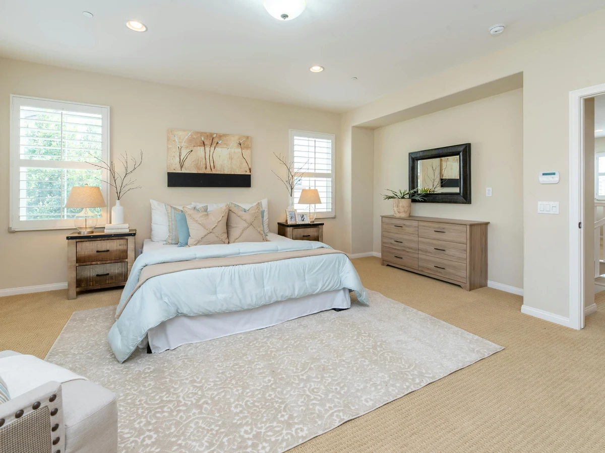 Spacious bright bedroom painted by Surrey Decorators bedroom painters