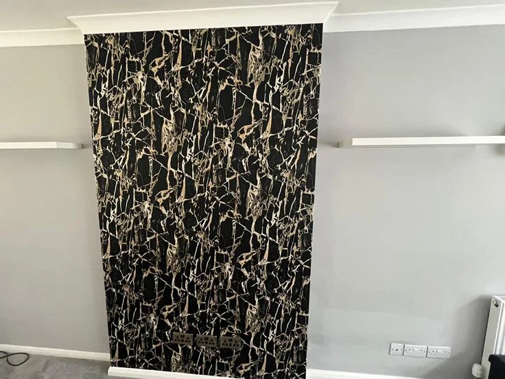Black and gold wallpaper feature wall by PA Painting & Decorating — Surrey Decorators