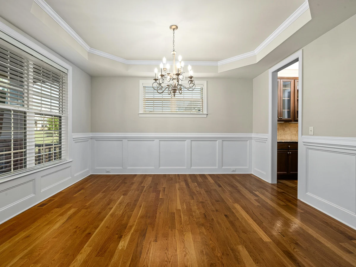 Empty formal dining room prepared for painting in Surrey