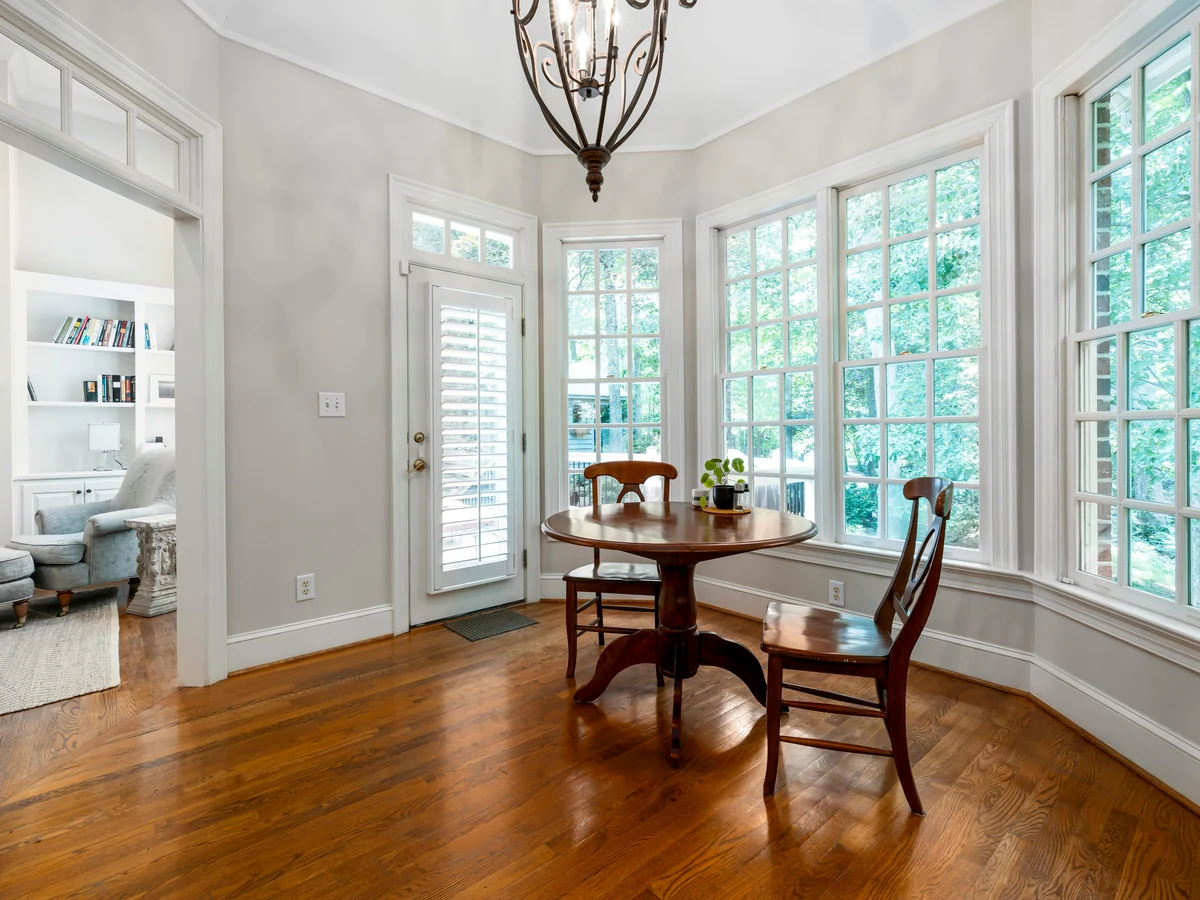 Grey dining room professionally decorated by Surrey Decorators
