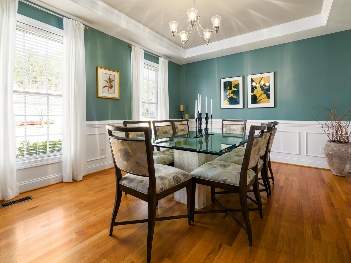 Teal wainscoted dining room painted by Surrey Decorators