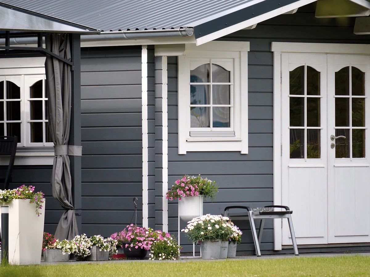 Grey and white timber exterior painting in Surrey by Surrey Decorators