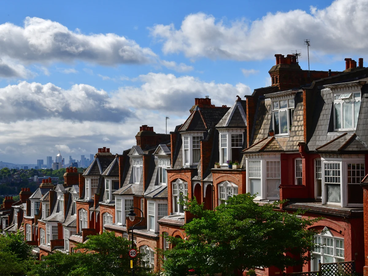 Row of Victorian red brick terraced houses in East Molesey painted by Surrey Decorators