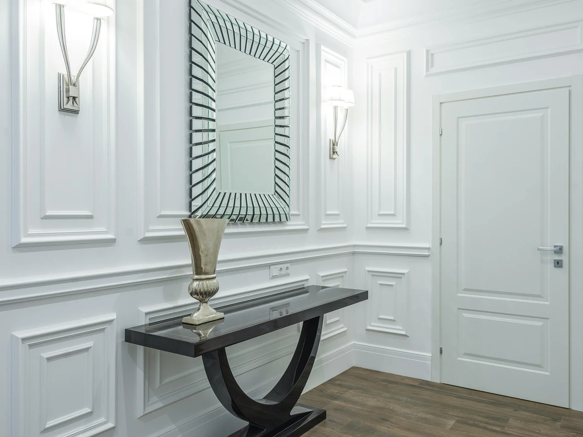 Elegant white panelled hallway freshly painted in Surrey home