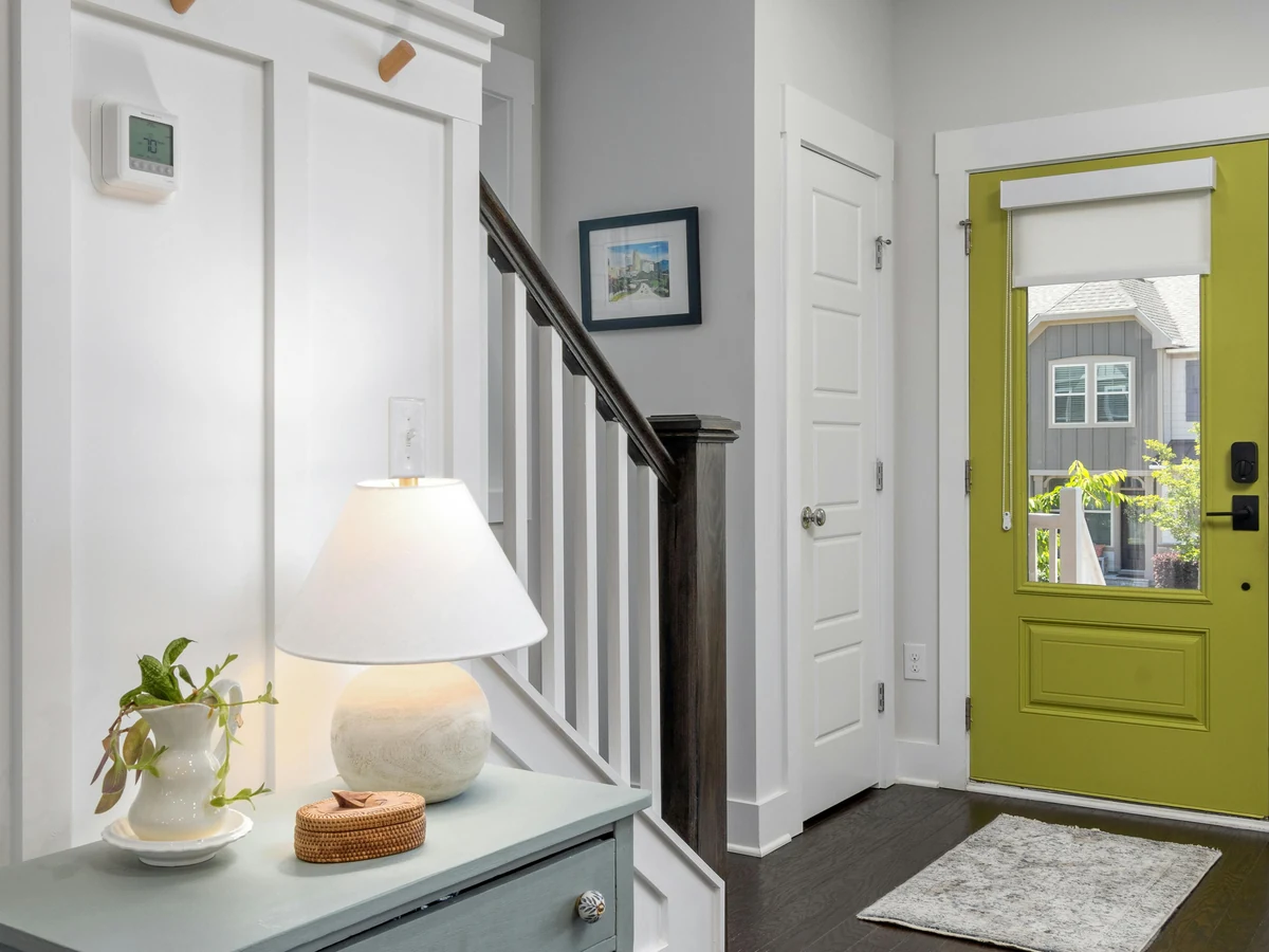 Hallway painting in Surrey by Surrey Decorators, bright entrance hallway with professional finish