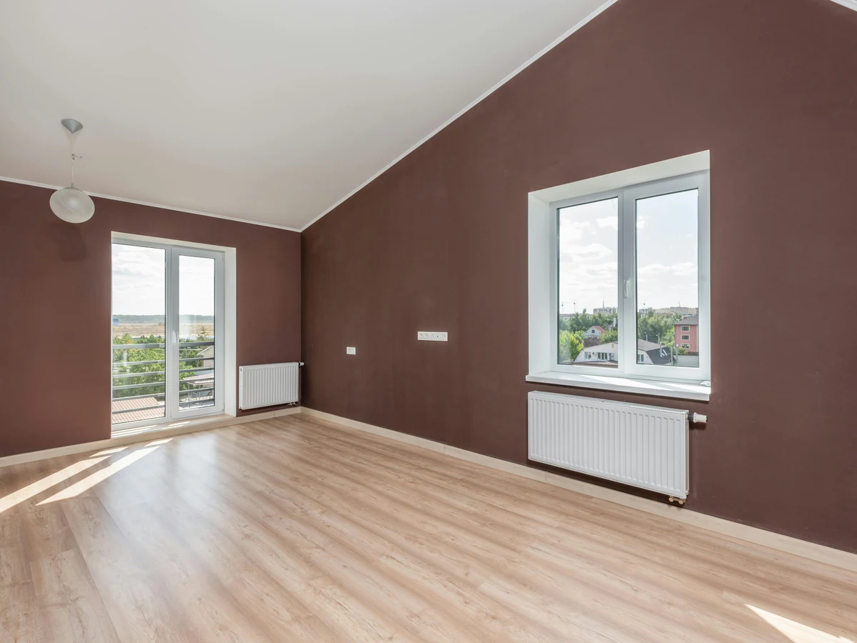Interior painting in Ewell, dark moody empty room freshly painted by Surrey Decorators